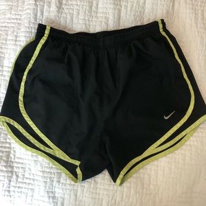 Black and yellow dry fit Nike running shorts in S